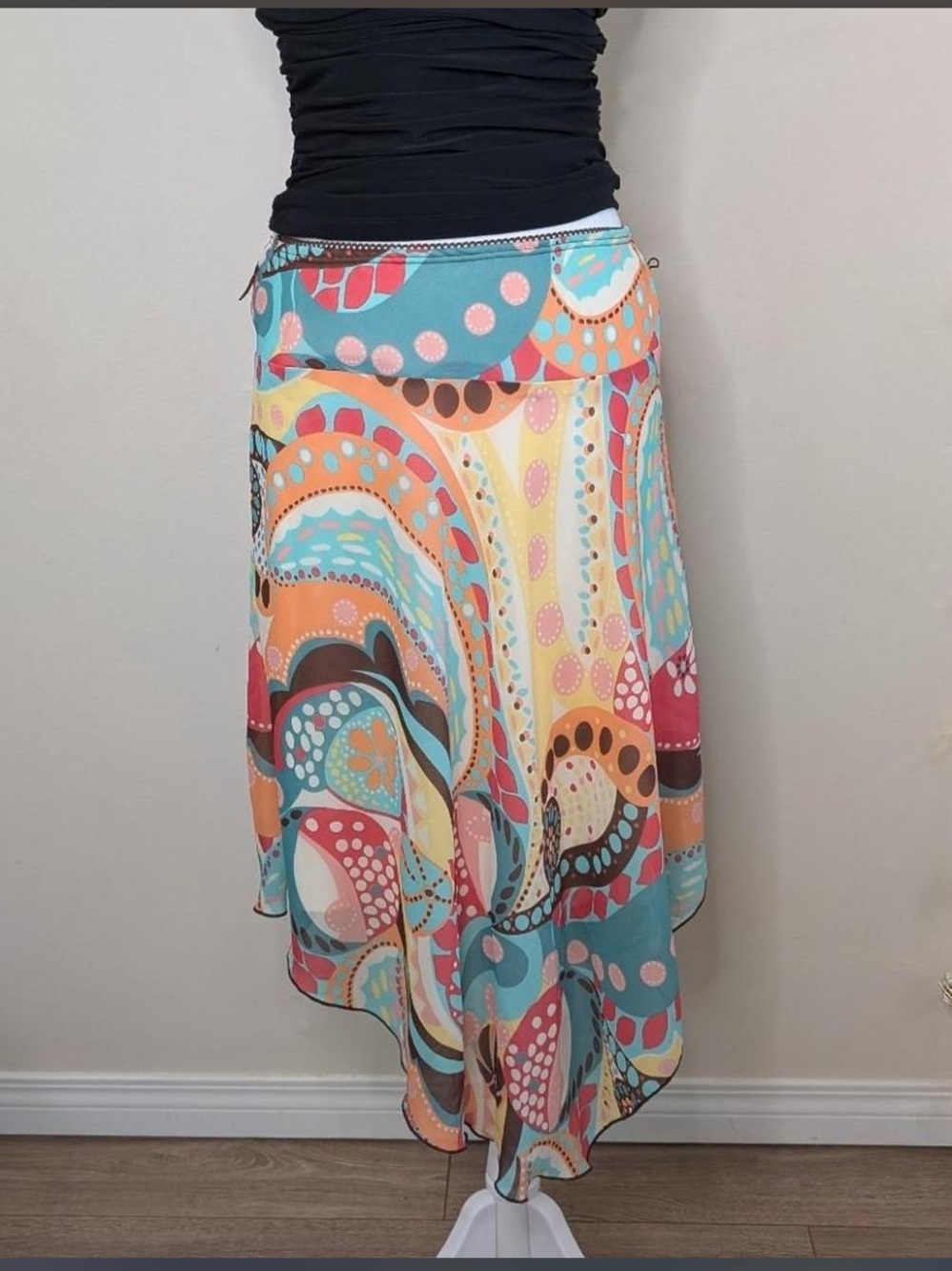 Y2K asymmetrical, flowy skirt. Bright colorful paisley print.